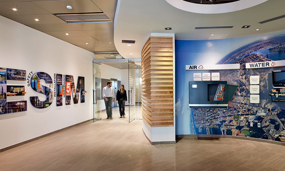 <p>Immediately upon entry, the lobby reflects Belimo’s commitment to the customer, with a well-appointed, two-story customer lounge space and interactive product display area.</p>
