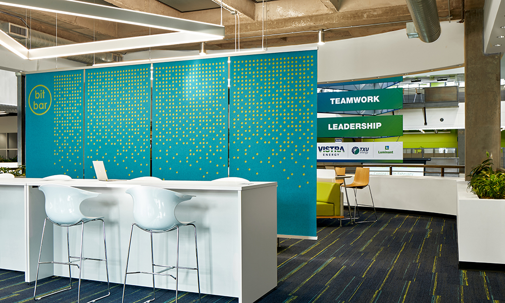 <p>An additional new amenity, the “Bit Bar,” offers technology services on demand for device and software training and troubleshooting, is located centrally on the second floor, immediately upon employee entry from the garage connector for convenient access.</p>
