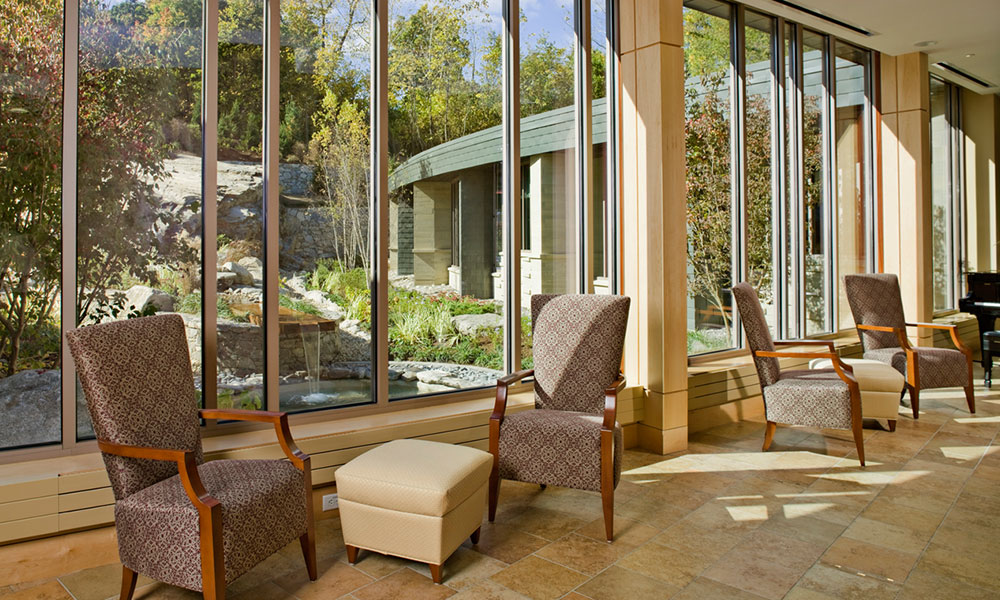 <p>The live sound of the water feature is transmitted into the lobby via a microphone within the garden setting. The water sound within The Center for Cancer Care enhances the power of the healing garden and brings nature inside.</p>
