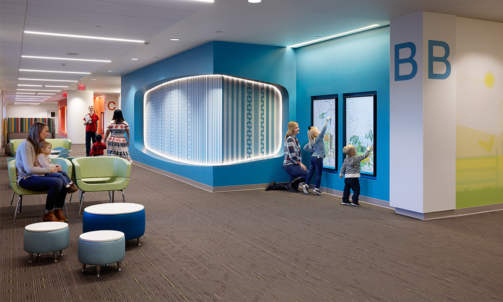 <p>Patients and families are directed to one of four easily identifiable pods, designated with a letter and color. Separation of patient and staff circulation facilitates a calm, soothing atmosphere and efficient work flows for the care team.</p>
