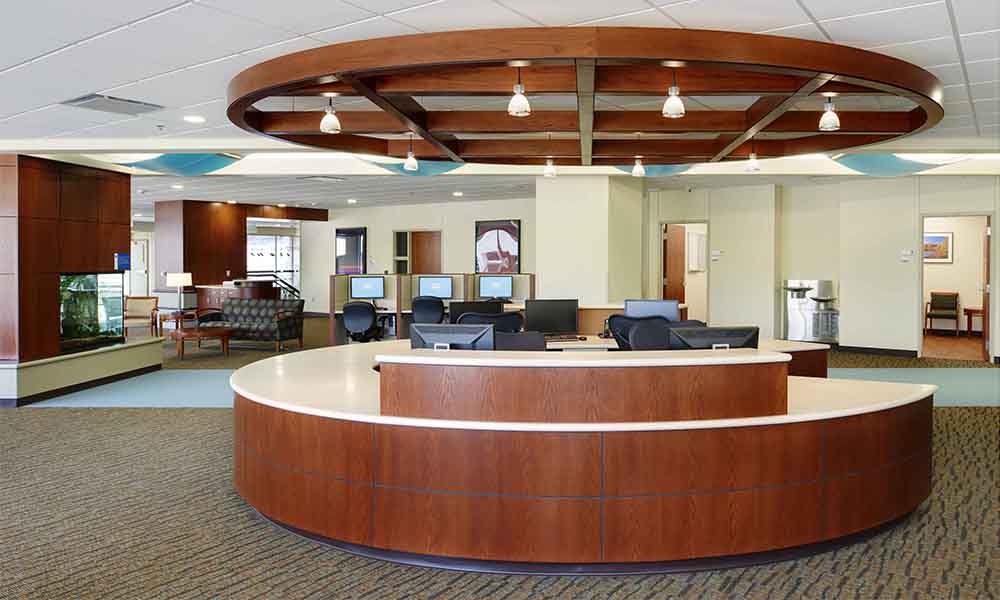 <p>A resource center is staffed throughout the day and features a living room type setting with aquarium, couch and chairs, along with carrels, computers, and offices for more private work.</p>
