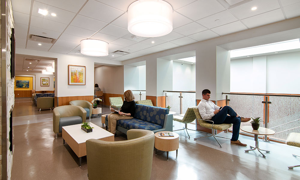 <p>A new seating area with an inviting fireplace provides a comforting and welcoming atmosphere. </p>
