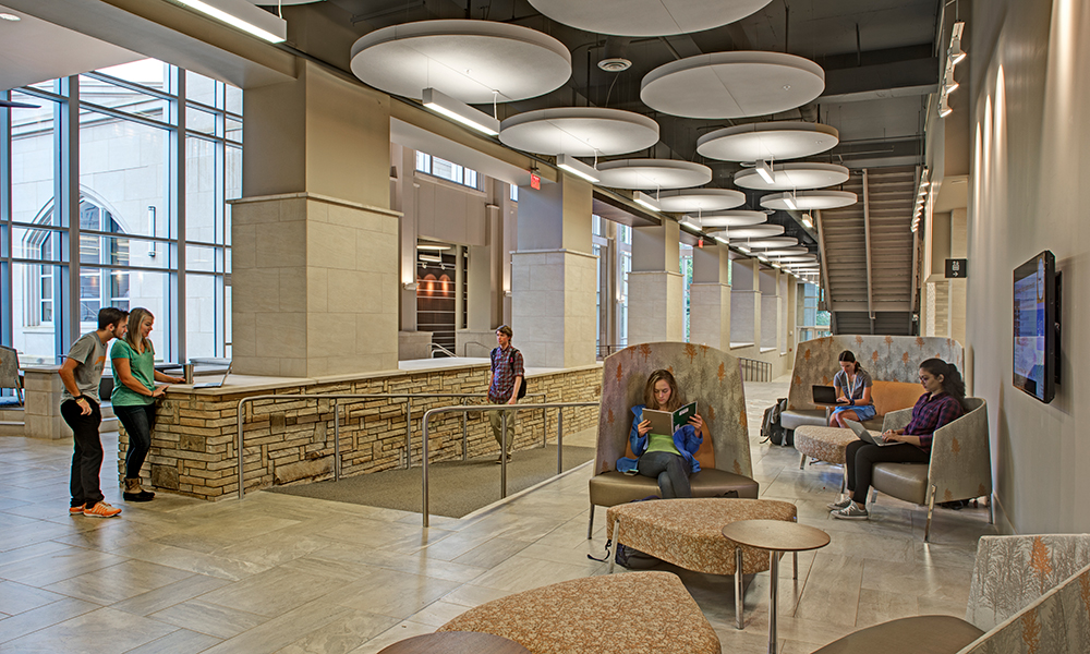 <p>Floating ceilings recall celestial bodies, while horizontal wood panels in varying widths recall striations in the Earth’s surface.</p>
