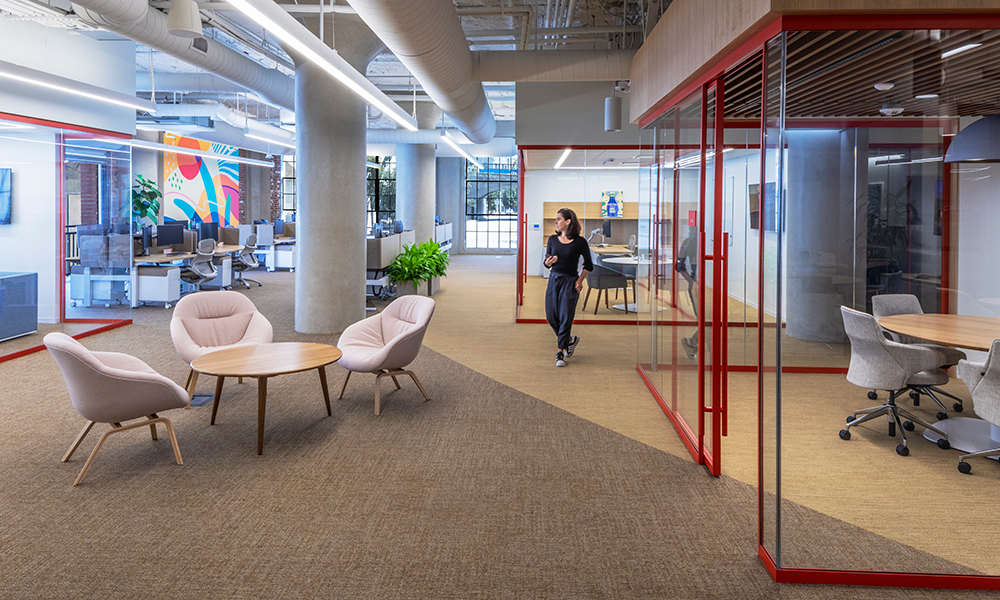 <p>Award winning branding is integrated into the office design through office room trim and carpet patterns.</p>
