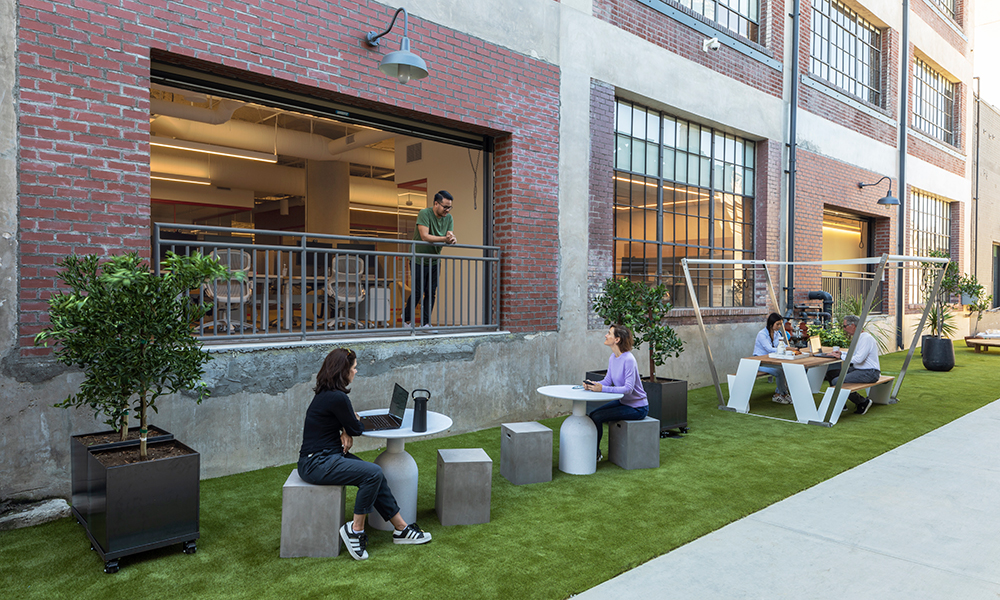 <p>Located in the Arts District of Los Angeles, the new office of Califia Farms is a block from the company’s original inception point. Vital indoor-outdoor connections, branding elements and office operations are visible from the street while roll-up garage doors open out to a patio to extend the office atmosphere into downtown LA’s streetscape. </p>
